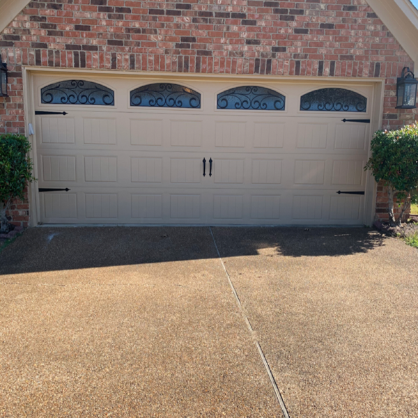 Door By Door garage door technicians serving Memphis homeowners